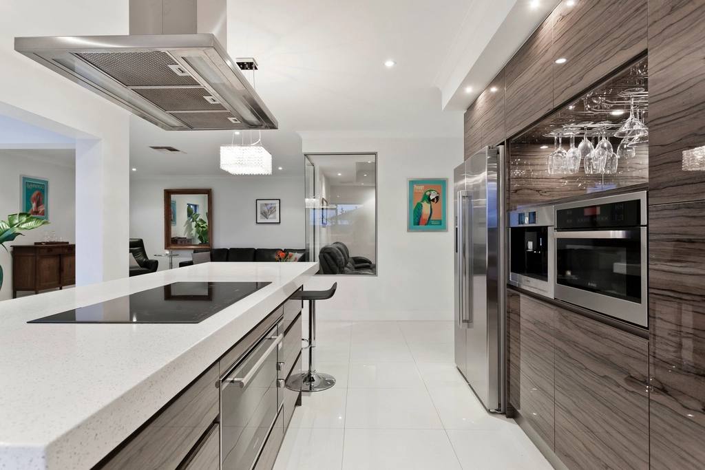 Modern kitchen with island and stainless appliances